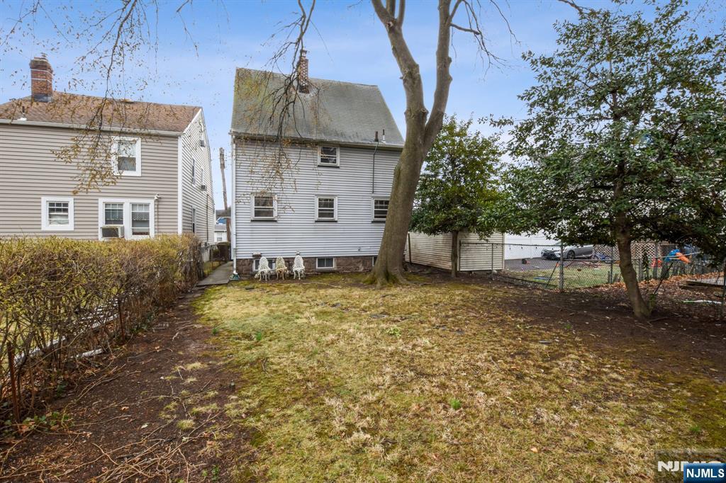 60 Berkeley Avenue Bloomfield, NJ 07003 - Photo 15 of 17 a view of a house with a yard