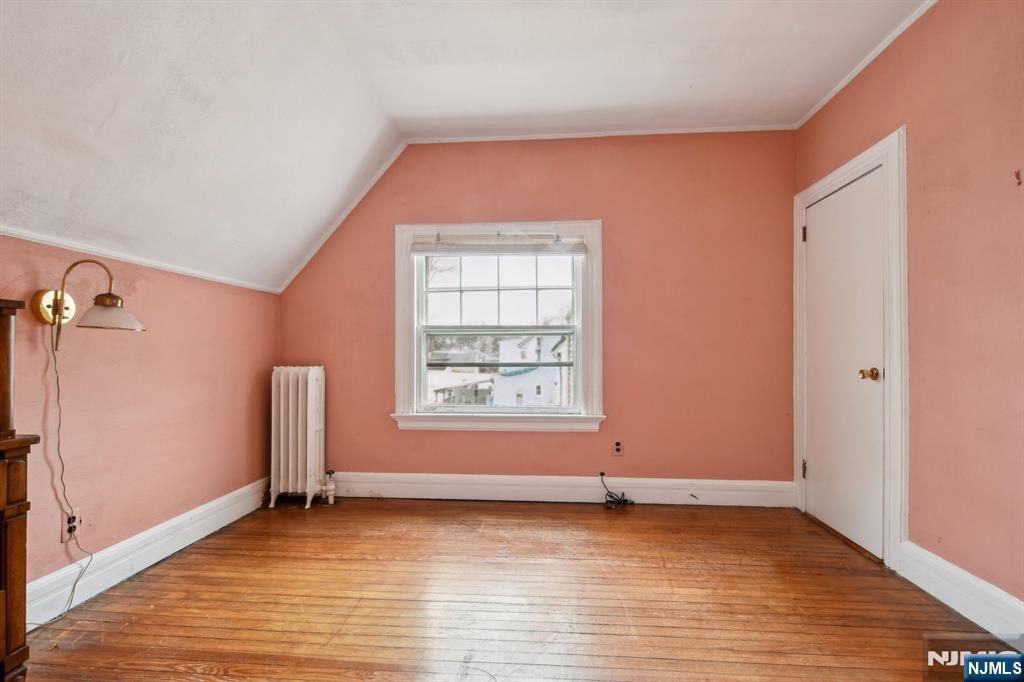 60 Berkeley Avenue Bloomfield, NJ 07003 - Photo 8 of 17 an empty room with window