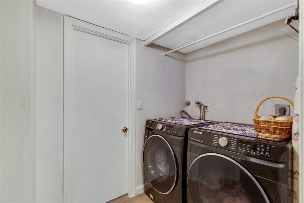 15 Conestoga Road Lexington, MA 02421 - Photo 21 of 31 a utility room with dryer and washer
