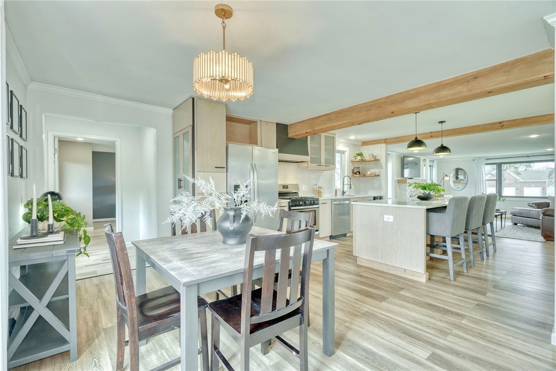 1056 Lake Road Ontario, NY 14519 - Photo 14 of 49 Eat-in area with slider to the back patio