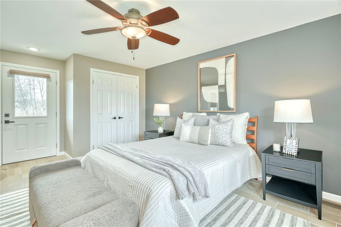 1056 Lake Road Ontario, NY 14519 - Photo 24 of 49 PRIVATE PRIMARY SUITE with own access to the backy