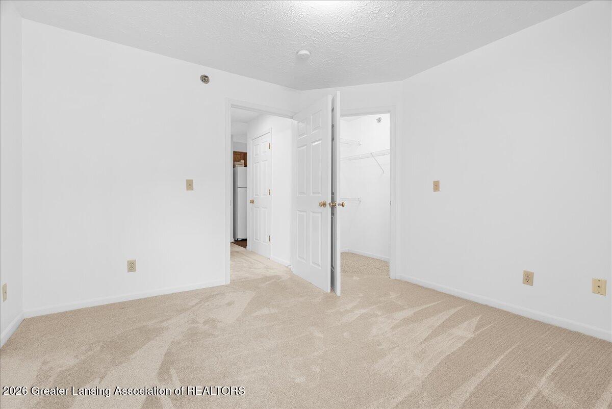 4452 Cricket Ridge Drive, Unit 204 Holt, MI 48842 - Photo 25 of 39 32-Media Jett - 34