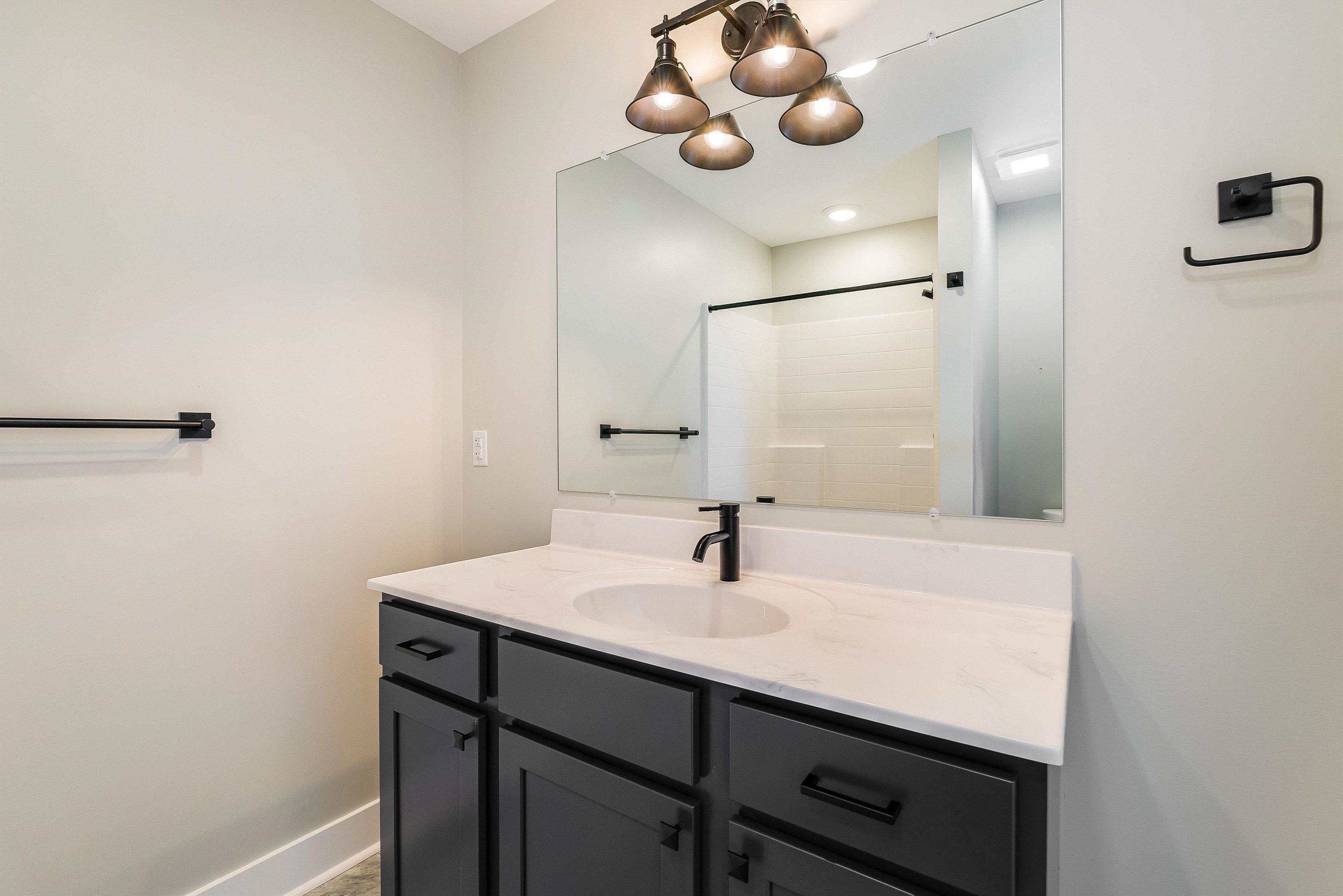 17 Barnyard Circle Bridgewater, VA 22812 - Photo 30 of 74 a bathroom with a sink and mirror
