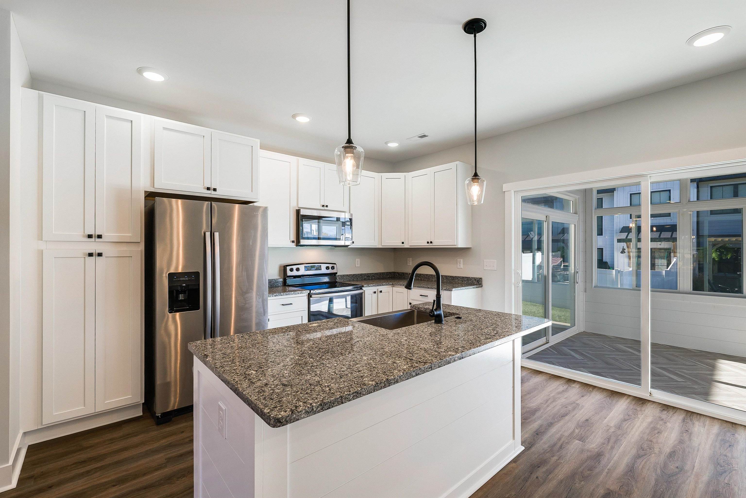 17 Barnyard Circle Bridgewater, VA 22812 - Photo 10 of 74 a kitchen with kitchen island a counter top space appliances and cabinets