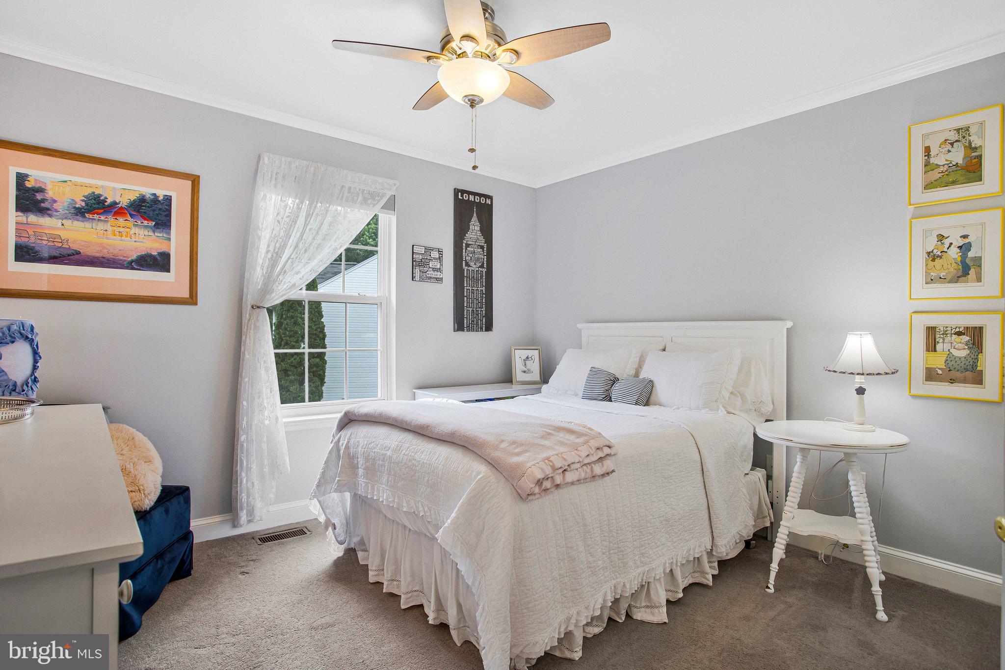 1582 Snug Harbor Road Shady Side, MD 20764 - Photo 35 of 53 Serene bedroom with soft hues.