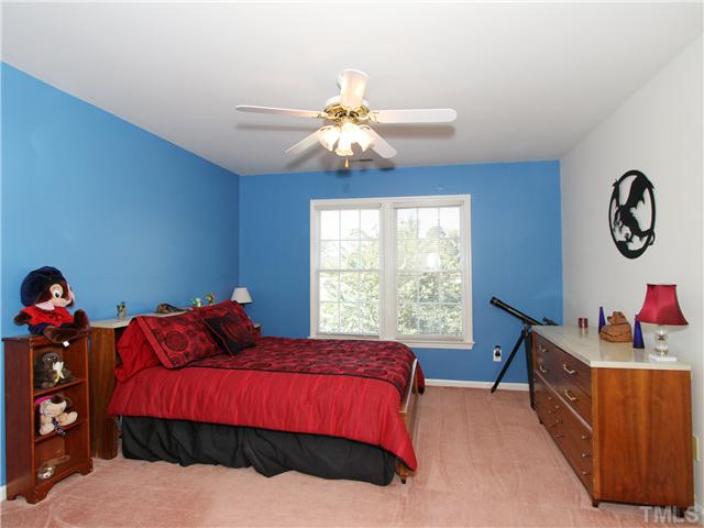 405 Normandy Road Louisburg, NC 27549 - Photo 12 of 22 The bedrooms have great closets & natural light.