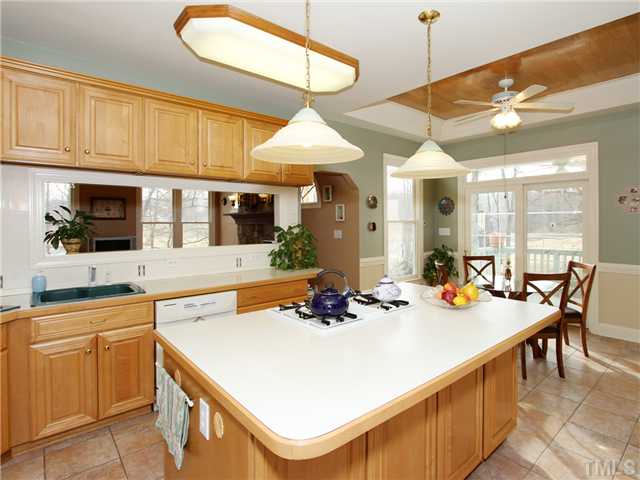 405 Normandy Road Louisburg, NC 27549 - Photo 6 of 22 The island is a perfect place for a quick breafast, or to visit with friends over tea.