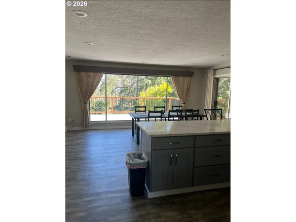 a bathroom with a sink and a large mirror