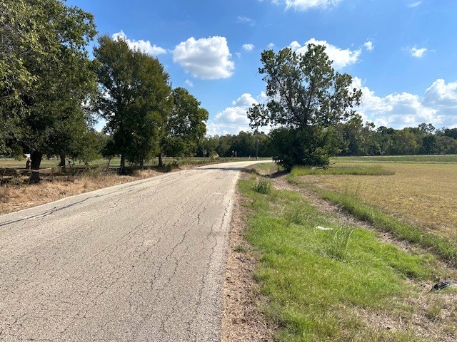 0 Little Dogie Road Wallis, TX 77485 - Photo 6 of 7 a backyard of a house with lots of green space