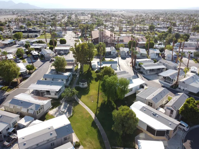 an aerial view of a city with lots of residential buildings