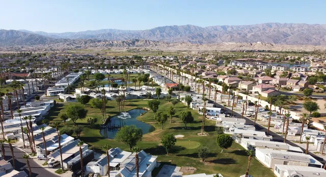 an aerial view of residential house and outdoor space