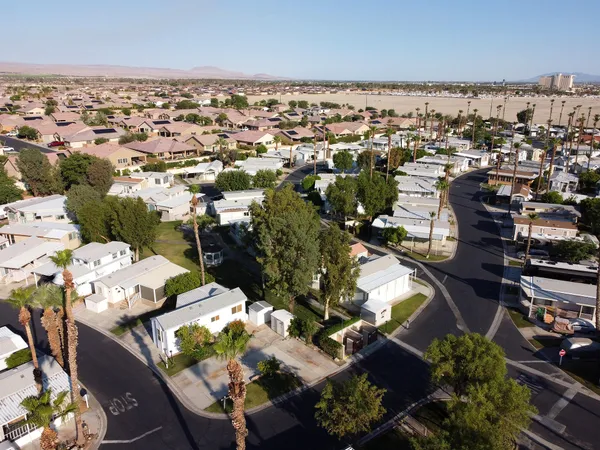 an aerial view of a houses with outdoor space