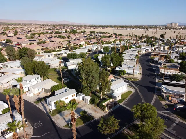 an aerial view of a houses with outdoor space