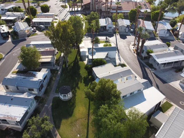 an aerial view of a swimming pool and outdoor space