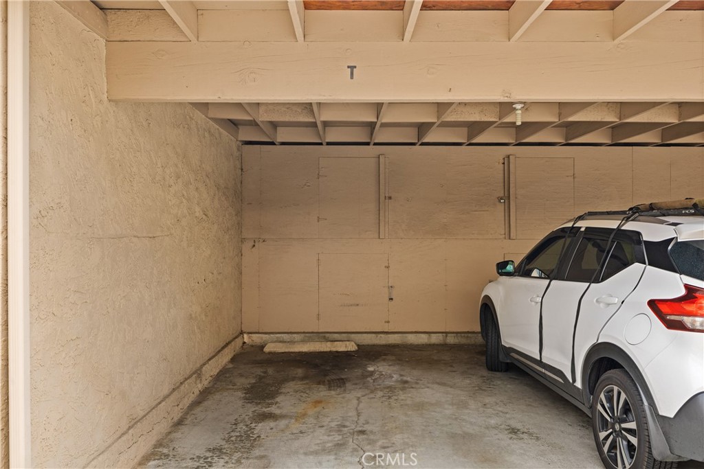2352 Altisma Way, Unit 4 Carlsbad, CA 92009 - Photo 31 of 32 Garage with storage