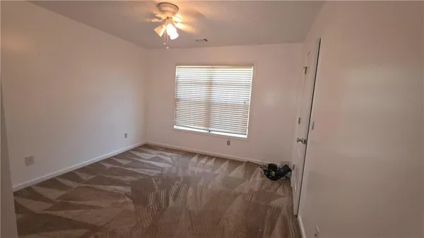 a view of a livingroom with a window