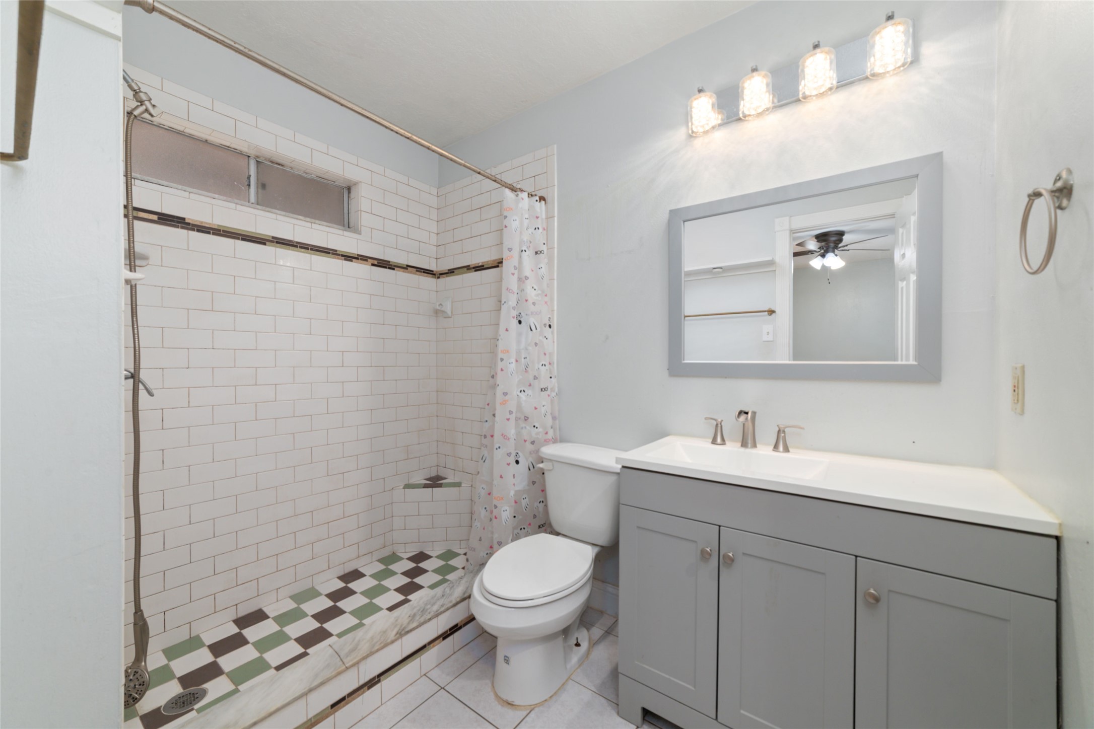 2318 Gum Spring Lane Spring, TX 77373 - Photo 16 of 25 a bathroom with a toilet sink shower and mirror