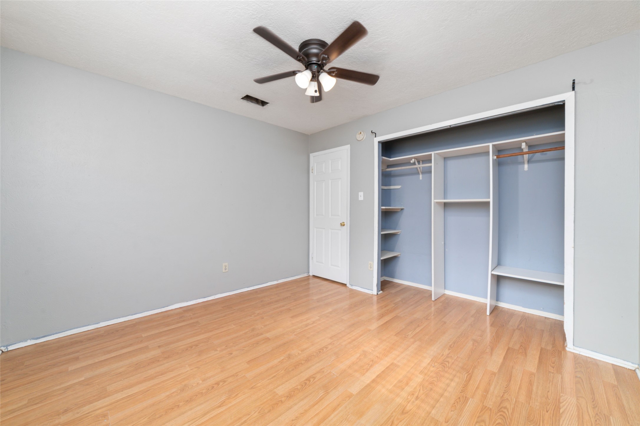 2318 Gum Spring Lane Spring, TX 77373 - Photo 19 of 25 a view of an empty room with a ceiling fan