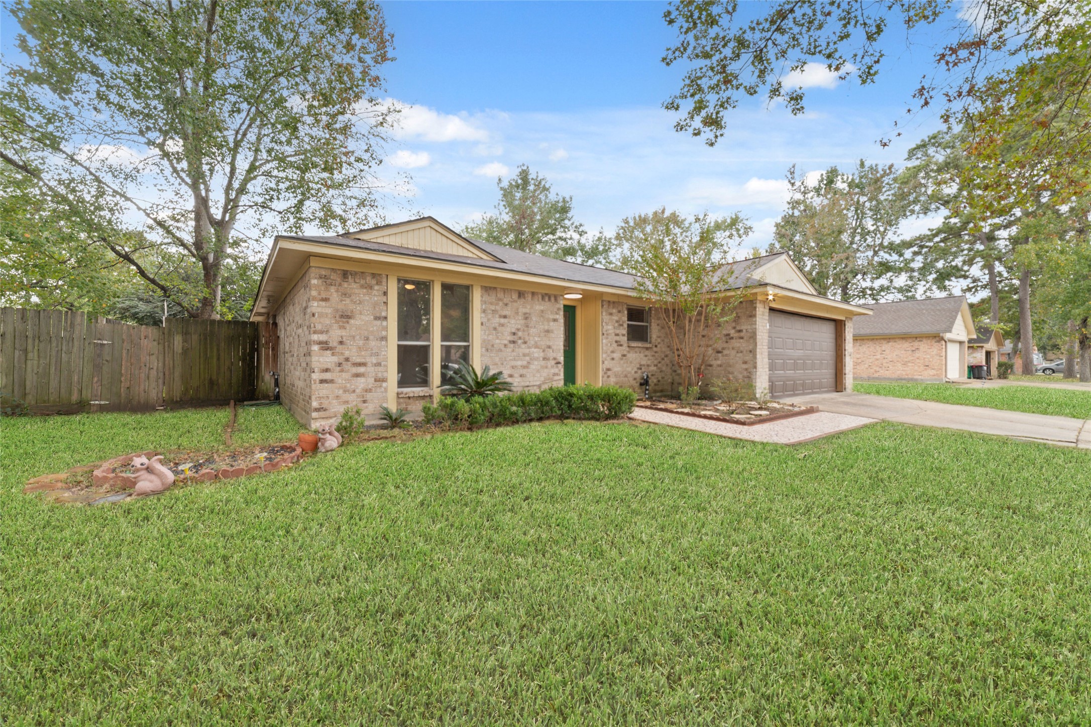 2318 Gum Spring Lane Spring, TX 77373 - Photo 2 of 25 a front view of house with yard and green space