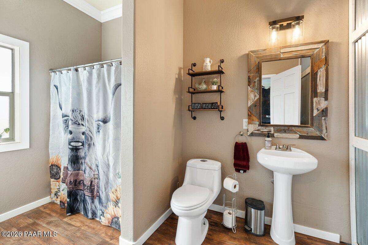 5757 East Longhorn Road Chino Valley, AZ 86323 - Photo 14 of 34 a bathroom with a sink toilet and shower