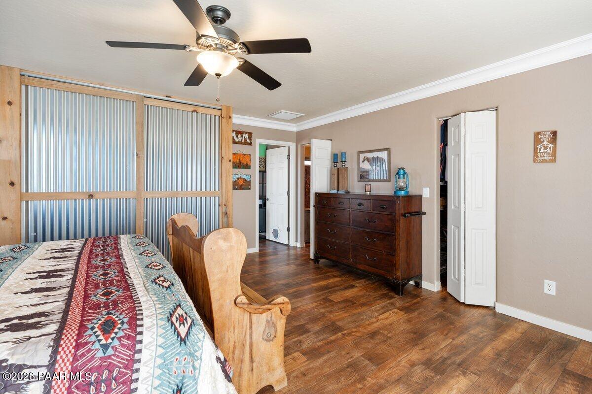 5757 East Longhorn Road Chino Valley, AZ 86323 - Photo 16 of 34 a bedroom with furniture and a rug