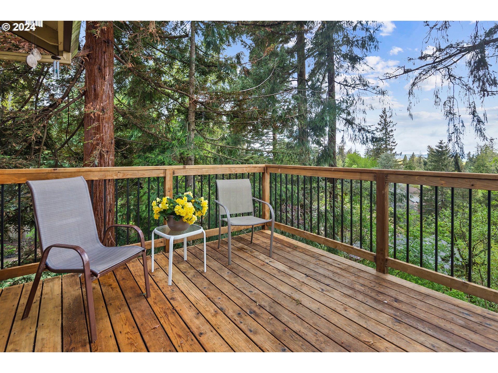 4243 Southwest Stephenson Street Portland, OR 97219 - Photo 11 of 48 a view of balcony with furniture and wooden floor