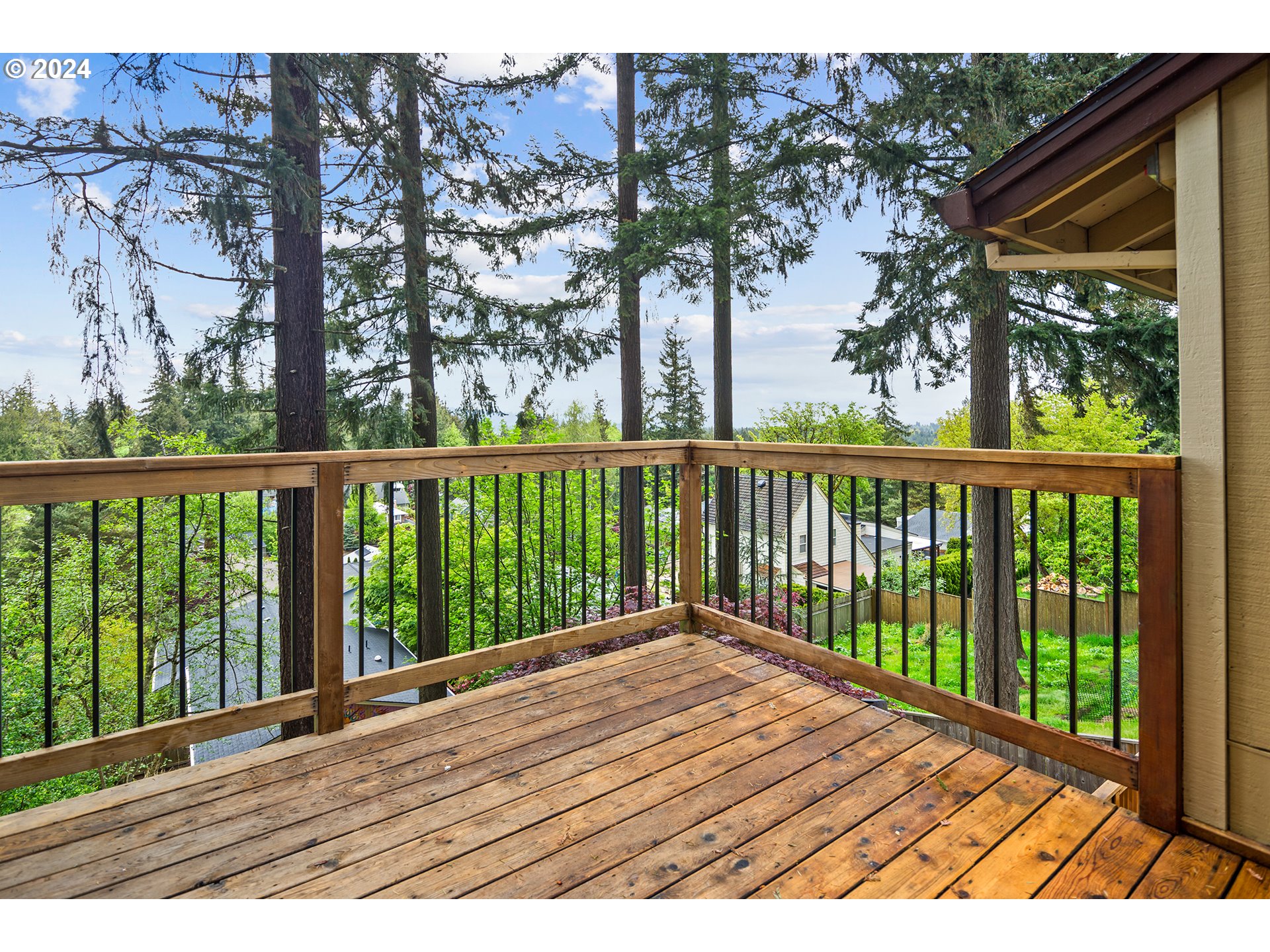 4243 Southwest Stephenson Street Portland, OR 97219 - Photo 12 of 48 a view of balcony with wooden floor