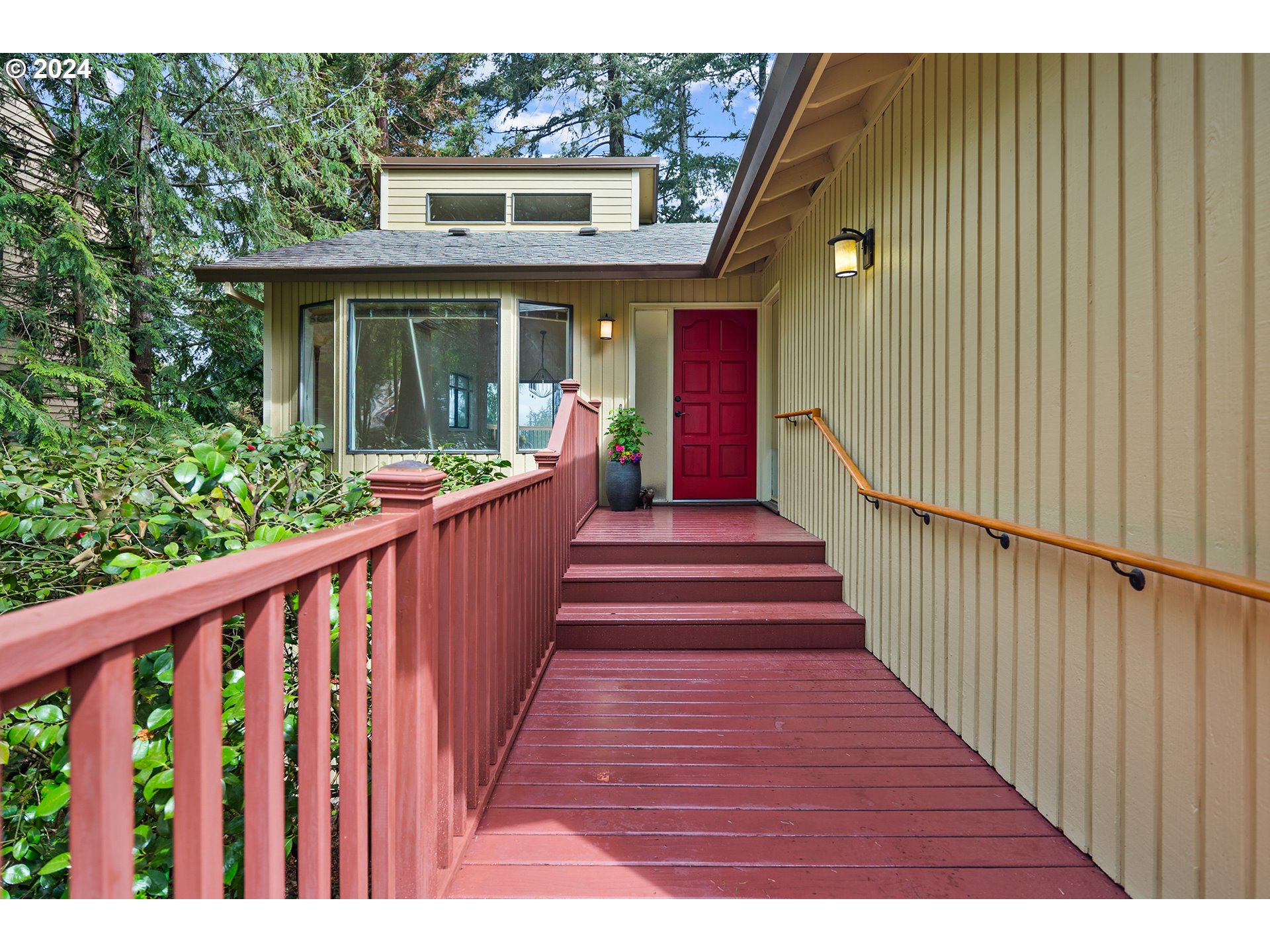 4243 Southwest Stephenson Street Portland, OR 97219 - Photo 3 of 48 a view of a house with wooden floor