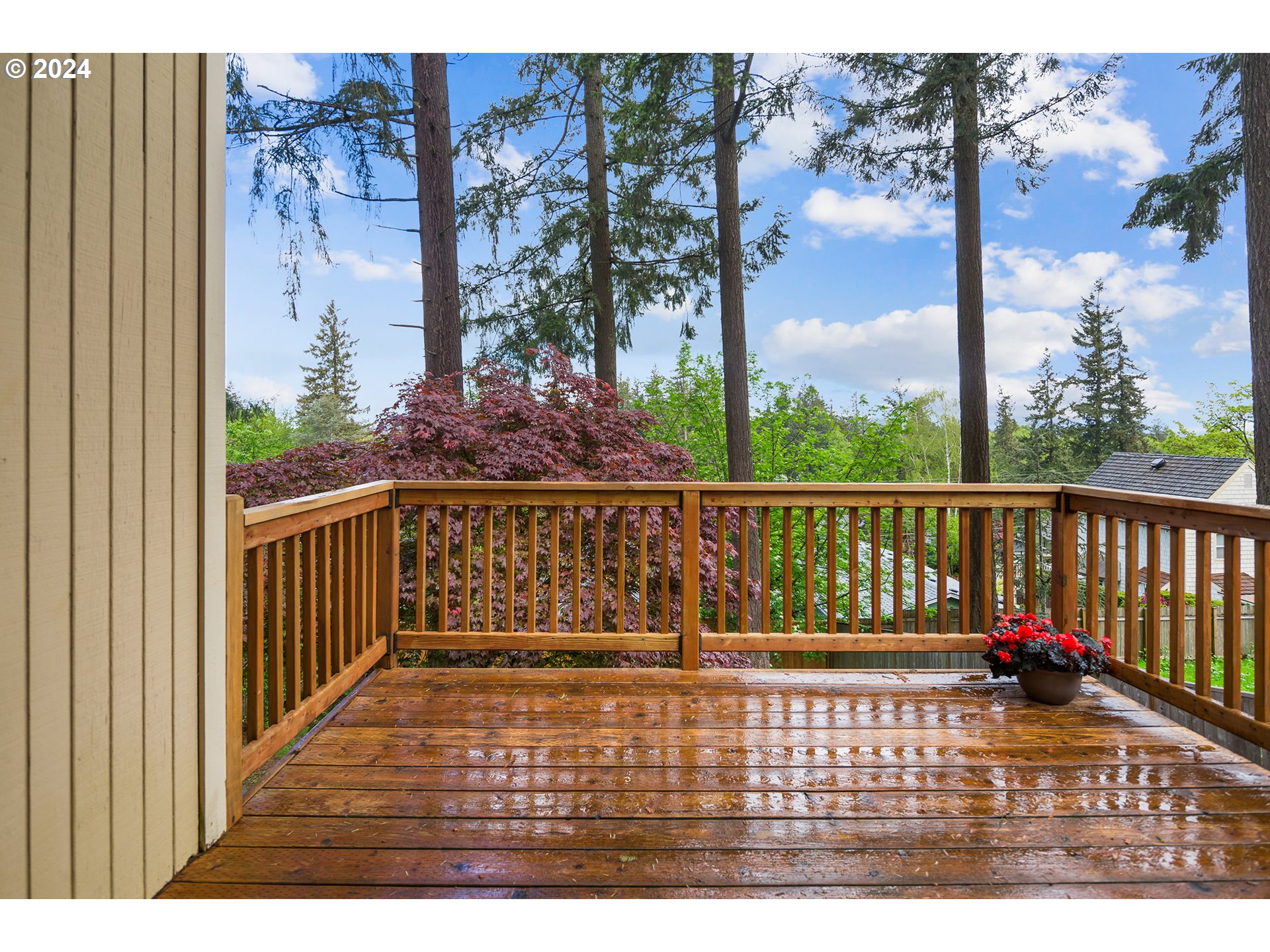 4243 Southwest Stephenson Street Portland, OR 97219 - Photo 38 of 48 a view of balcony with wooden floor