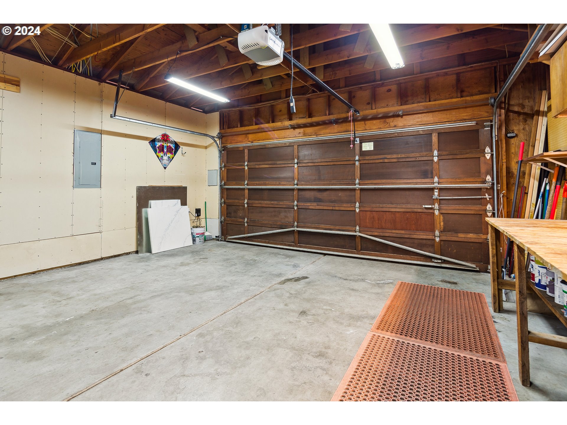 4243 Southwest Stephenson Street Portland, OR 97219 - Photo 40 of 48 a view of a room with wooden floor