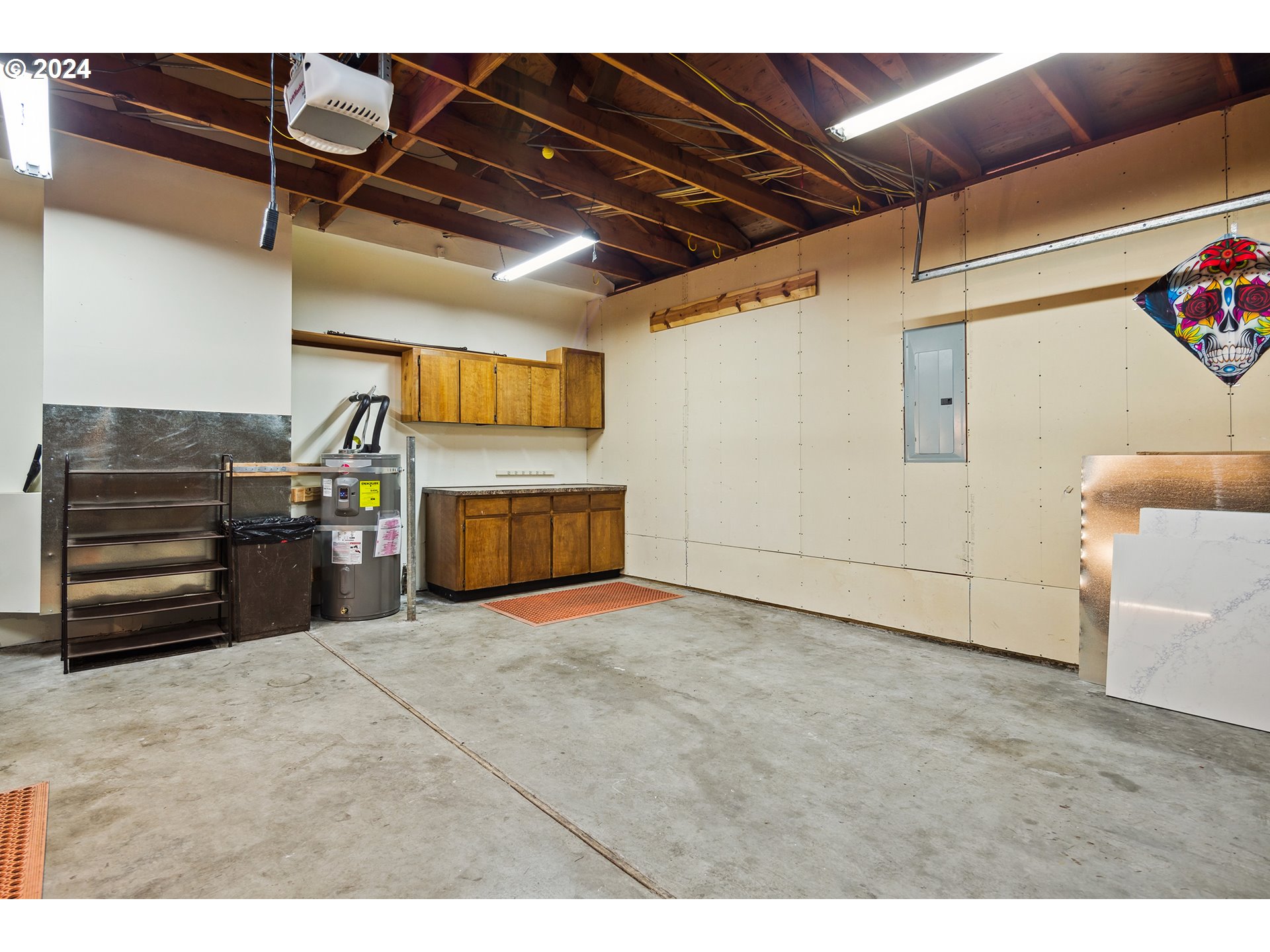 4243 Southwest Stephenson Street Portland, OR 97219 - Photo 42 of 48 a view of a garage with furniture
