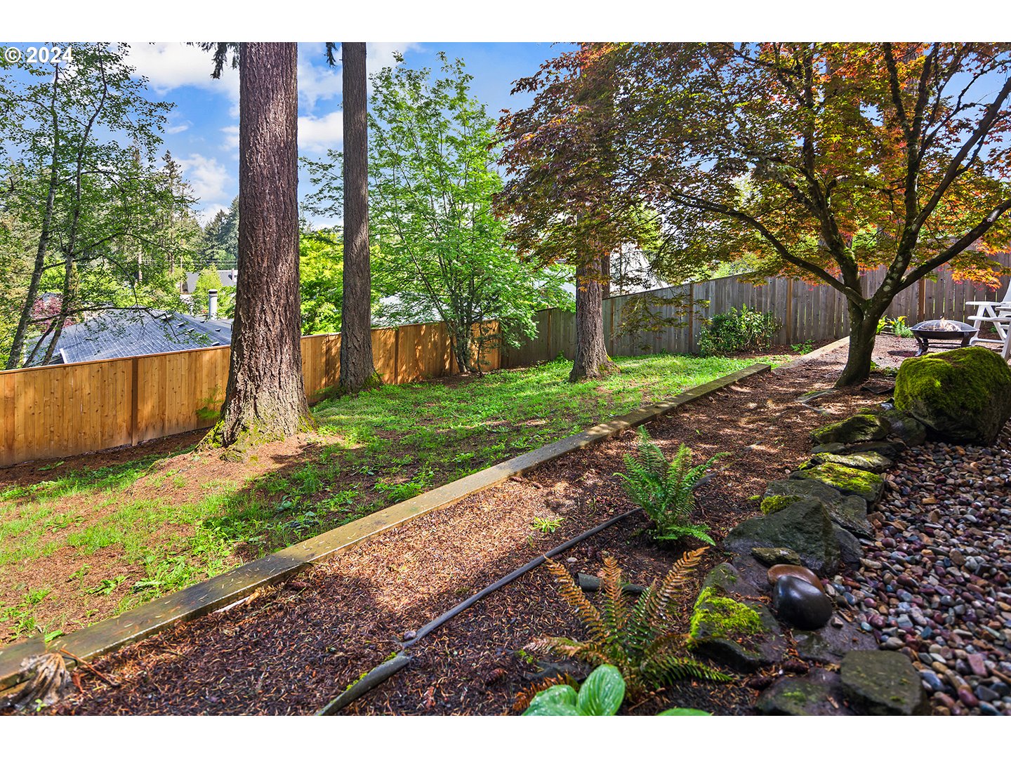 4243 Southwest Stephenson Street Portland, OR 97219 - Photo 45 of 48 a view of backyard with green space