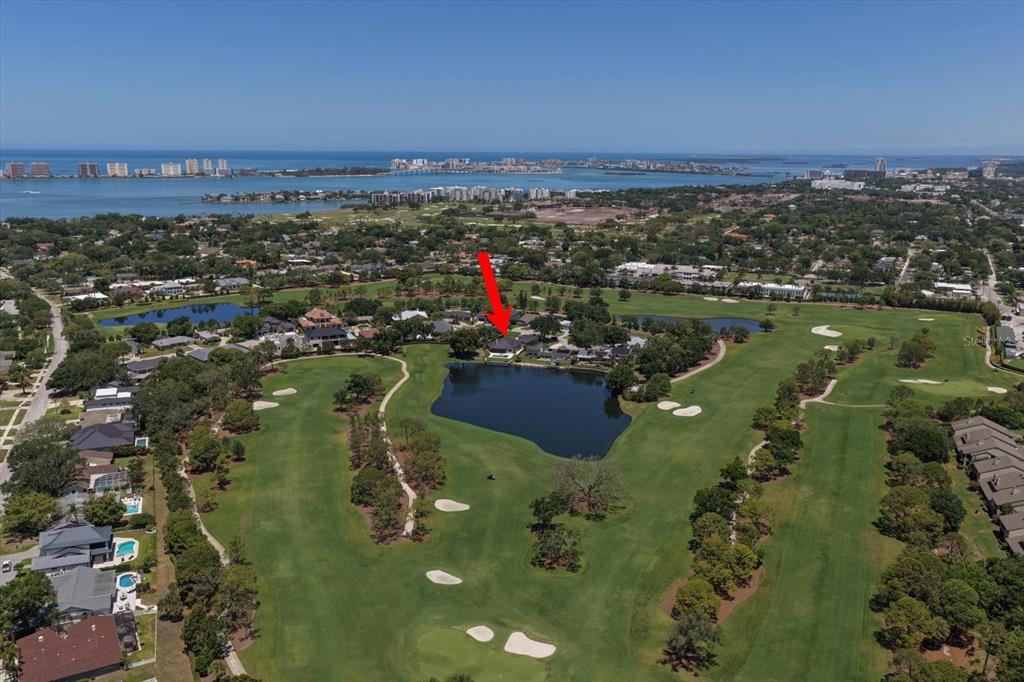 19 Hibiscus Road Belleair, FL 33756 - Photo 12 of 44 an aerial view of a houses with a lake view
