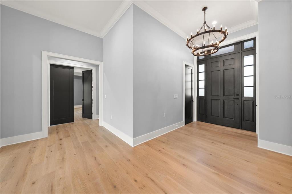 19 Hibiscus Road Belleair, FL 33756 - Photo 14 of 44 a view of a room with wooden floor