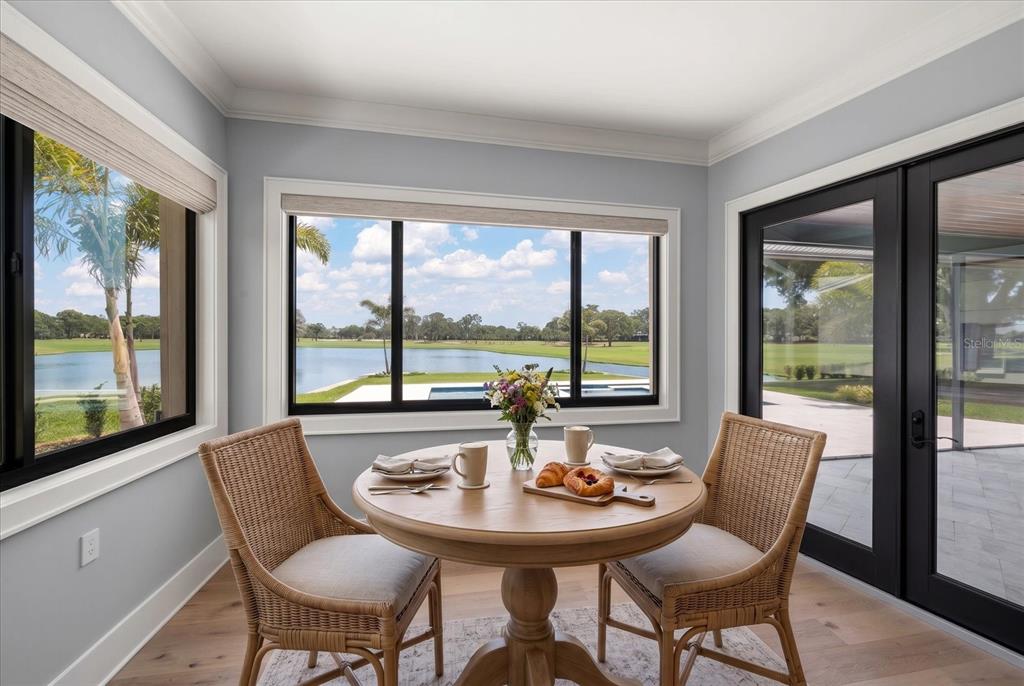 19 Hibiscus Road Belleair, FL 33756 - Photo 22 of 44 a view of a dining room with furniture window and outside view