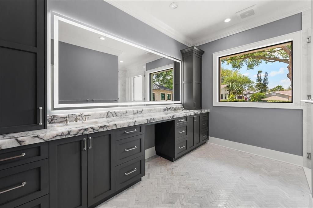 19 Hibiscus Road Belleair, FL 33756 - Photo 26 of 44 a bathroom with a granite countertop double vanity sink and mirror