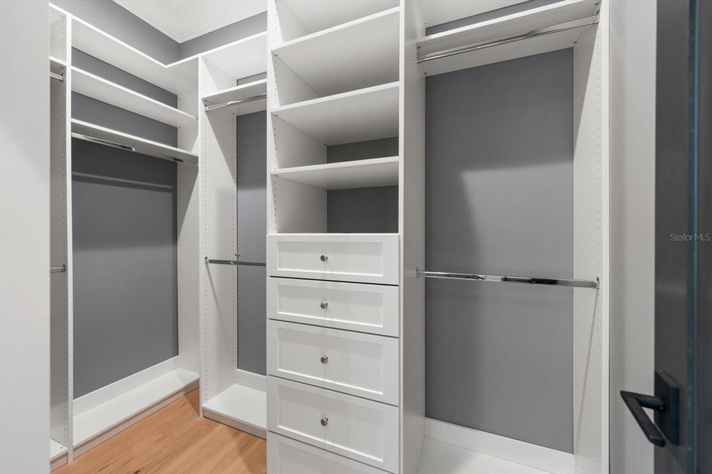 19 Hibiscus Road Belleair, FL 33756 - Photo 28 of 44 a view of walk in closet with empty racks