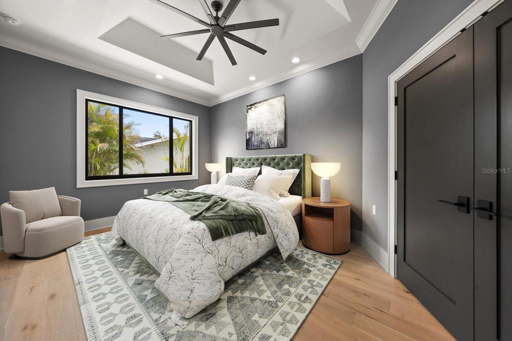 19 Hibiscus Road Belleair, FL 33756 - Photo 34 of 44 a bedroom with a large bed and a window