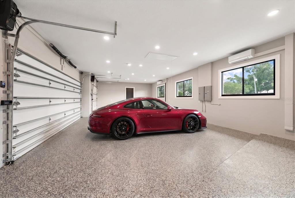 19 Hibiscus Road Belleair, FL 33756 - Photo 41 of 44 a view of car parked in garage
