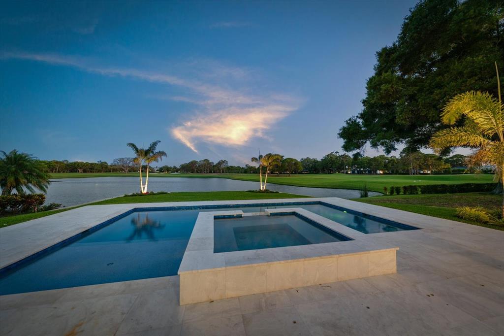 19 Hibiscus Road Belleair, FL 33756 - Photo 8 of 44 a view of swimming pool with a yard
