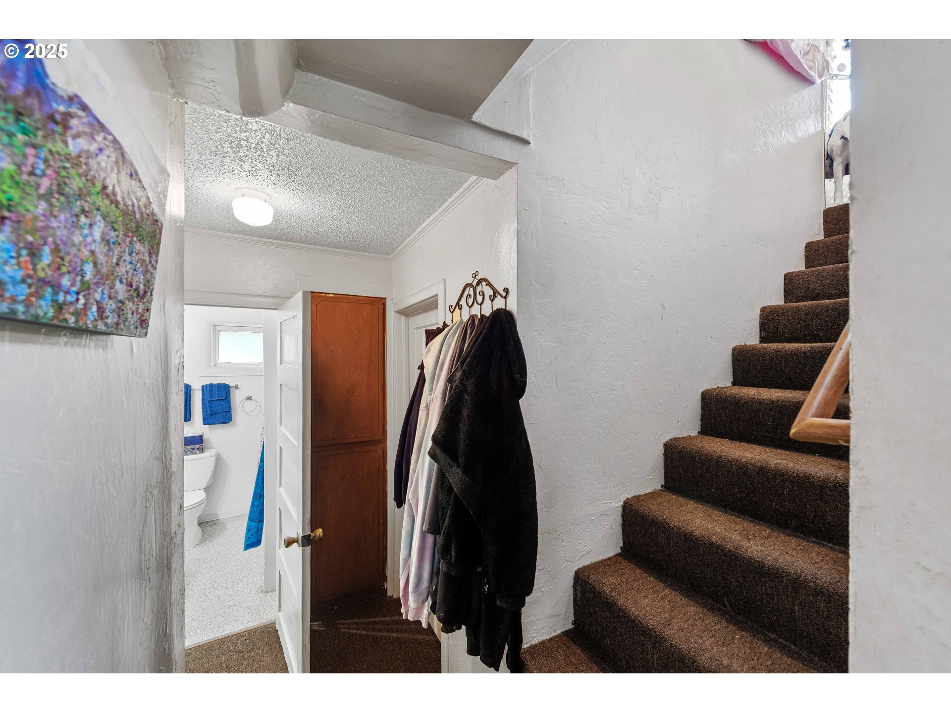 1902 Monroe Street North Bend, OR 97459 - Photo 15 of 48 a view of hallway with furniture and stairs