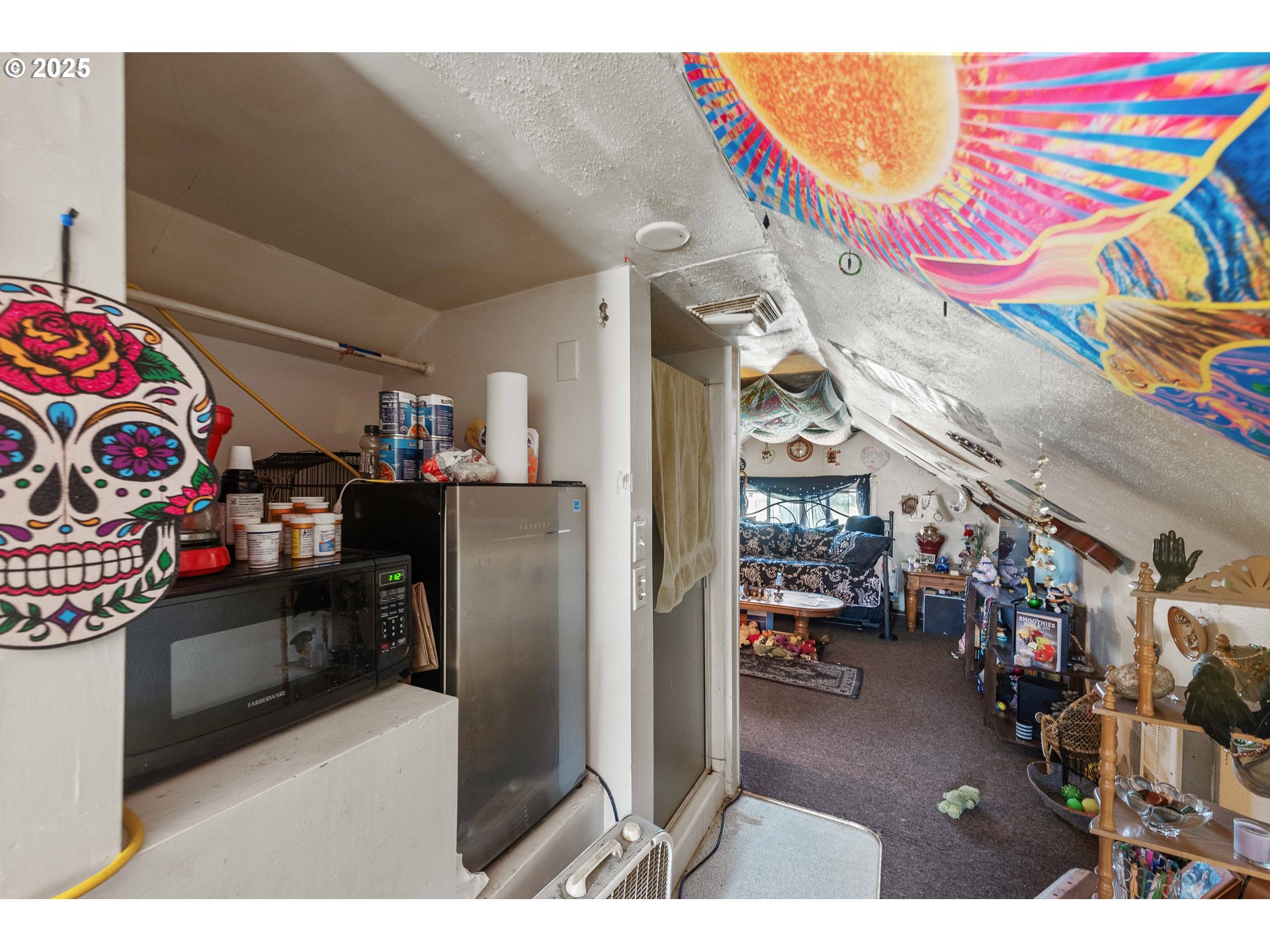 1902 Monroe Street North Bend, OR 97459 - Photo 17 of 48 a kitchen view with stainless steel appliances wooden floor and dining table