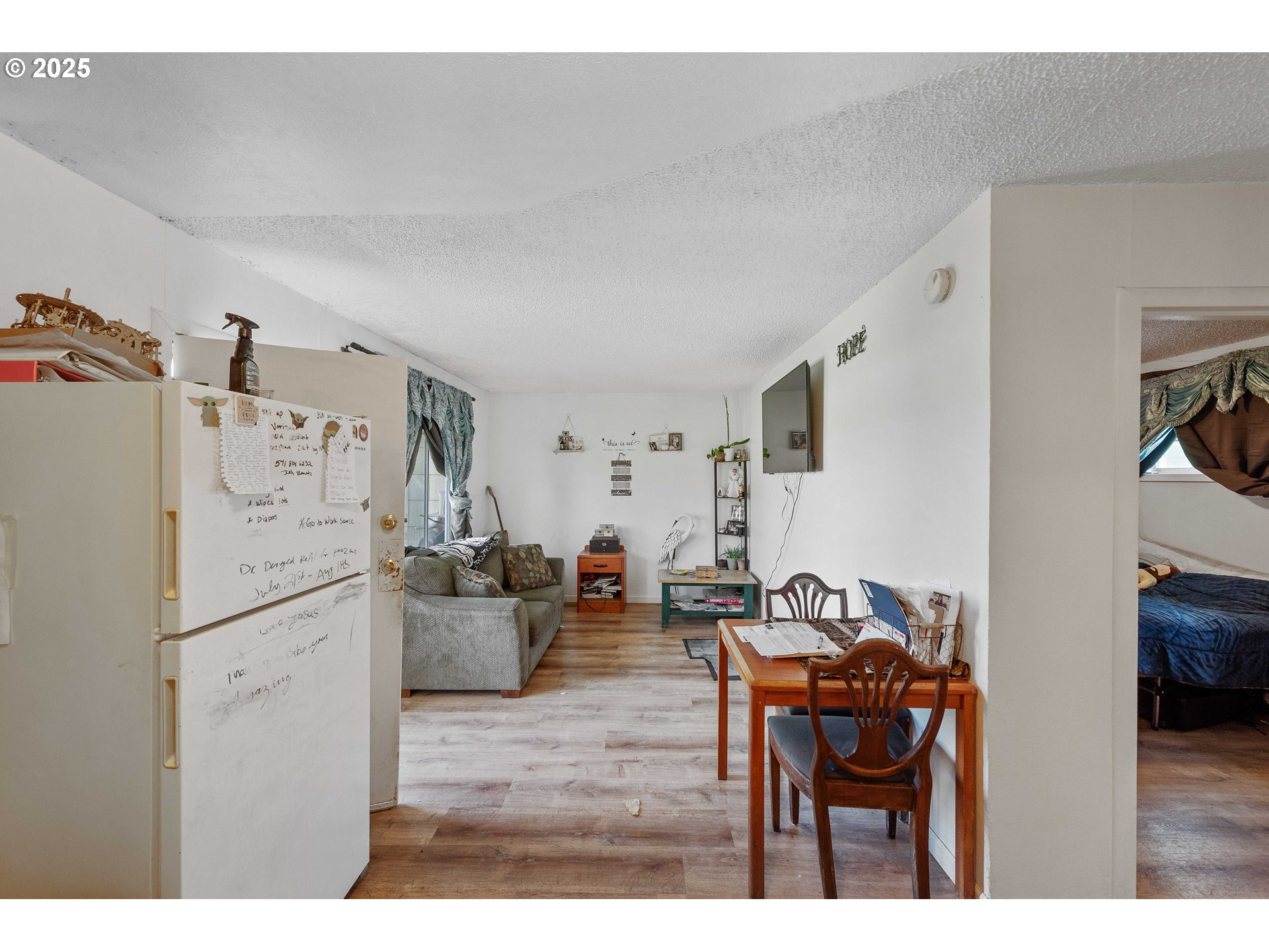 1902 Monroe Street North Bend, OR 97459 - Photo 19 of 48 a living room with furniture and a wooden floor
