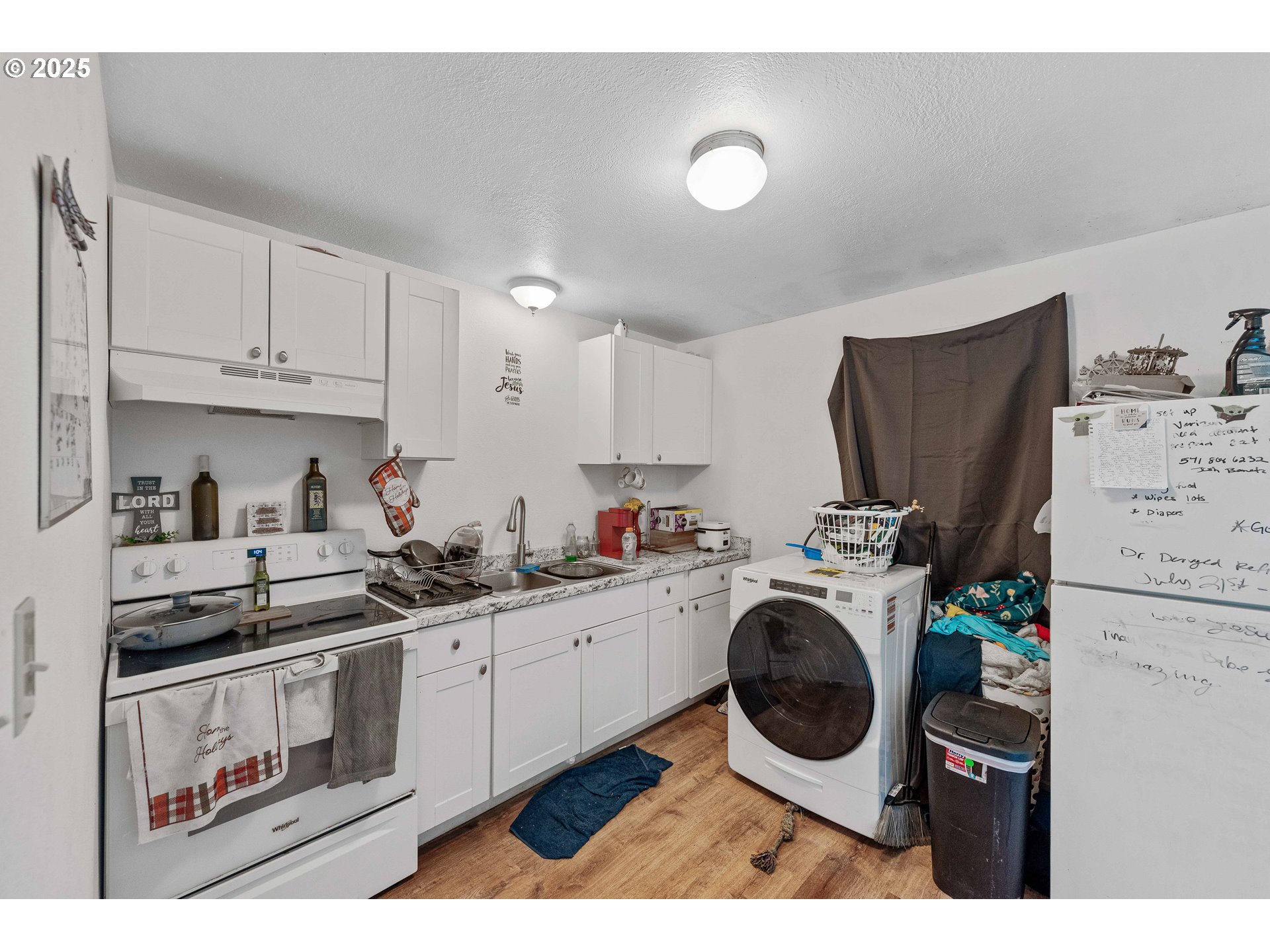 1902 Monroe Street North Bend, OR 97459 - Photo 21 of 48 a kitchen with a sink a stove and cabinets