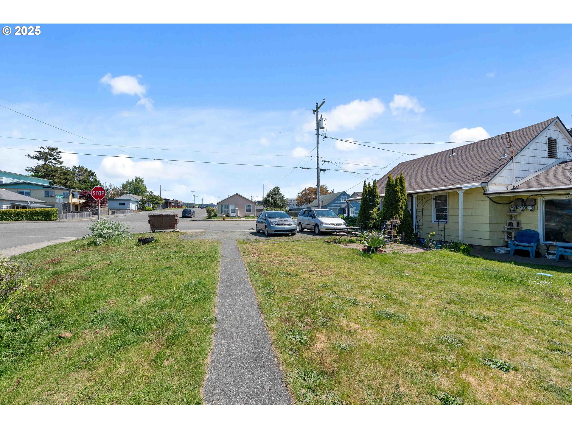 1902 Monroe Street North Bend, OR 97459 - Photo 3 of 48 a swimming pool with outdoor seating and yard