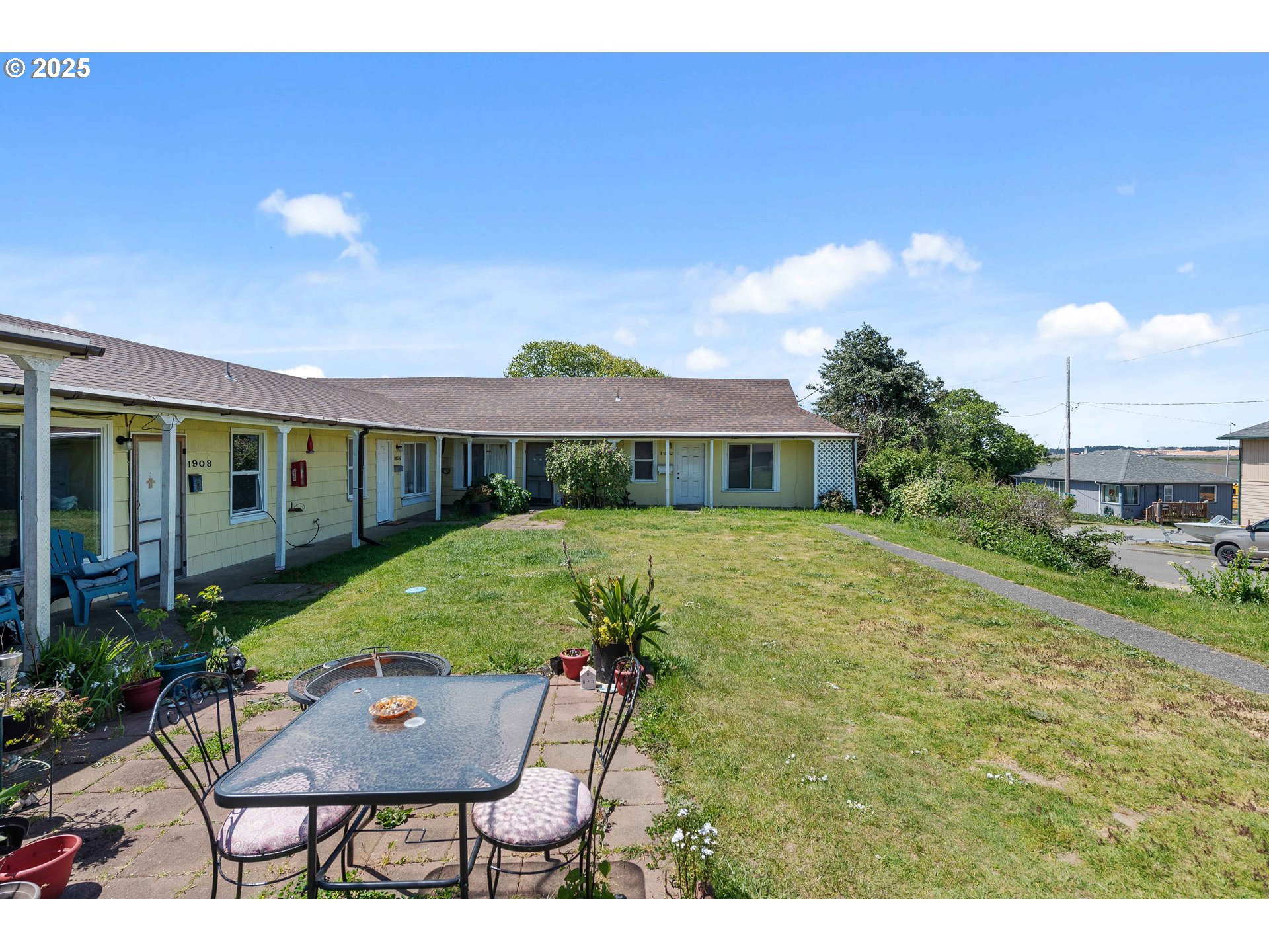 1902 Monroe Street North Bend, OR 97459 - Photo 4 of 48 a view of house with yard and entertaining space