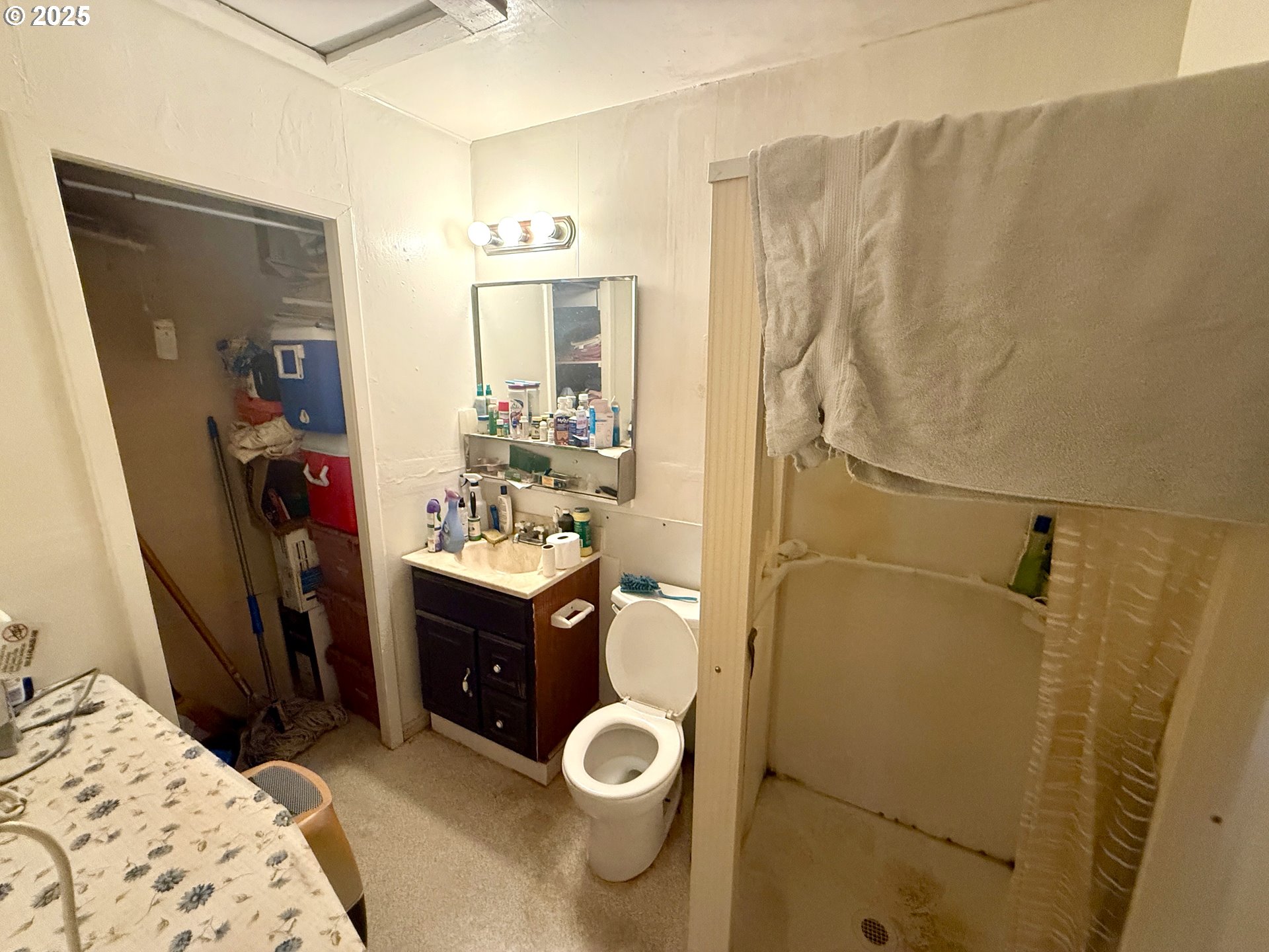 1902 Monroe Street North Bend, OR 97459 - Photo 47 of 48 a bathroom with a sink toilet and shower