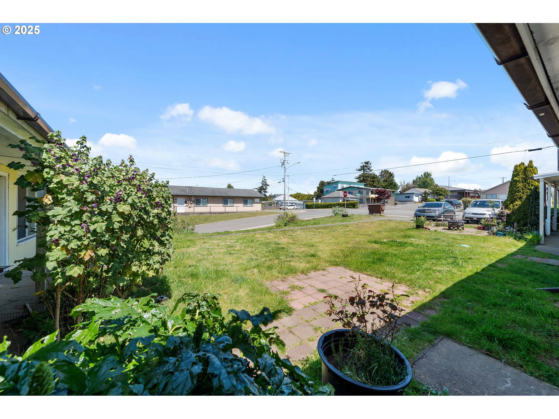 1902 Monroe Street North Bend, OR 97459 - Photo 7 of 48 a view of a lake with a big yard