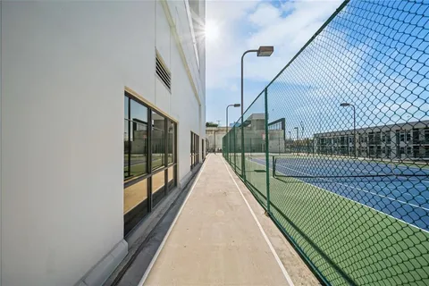 a view of a building with a street