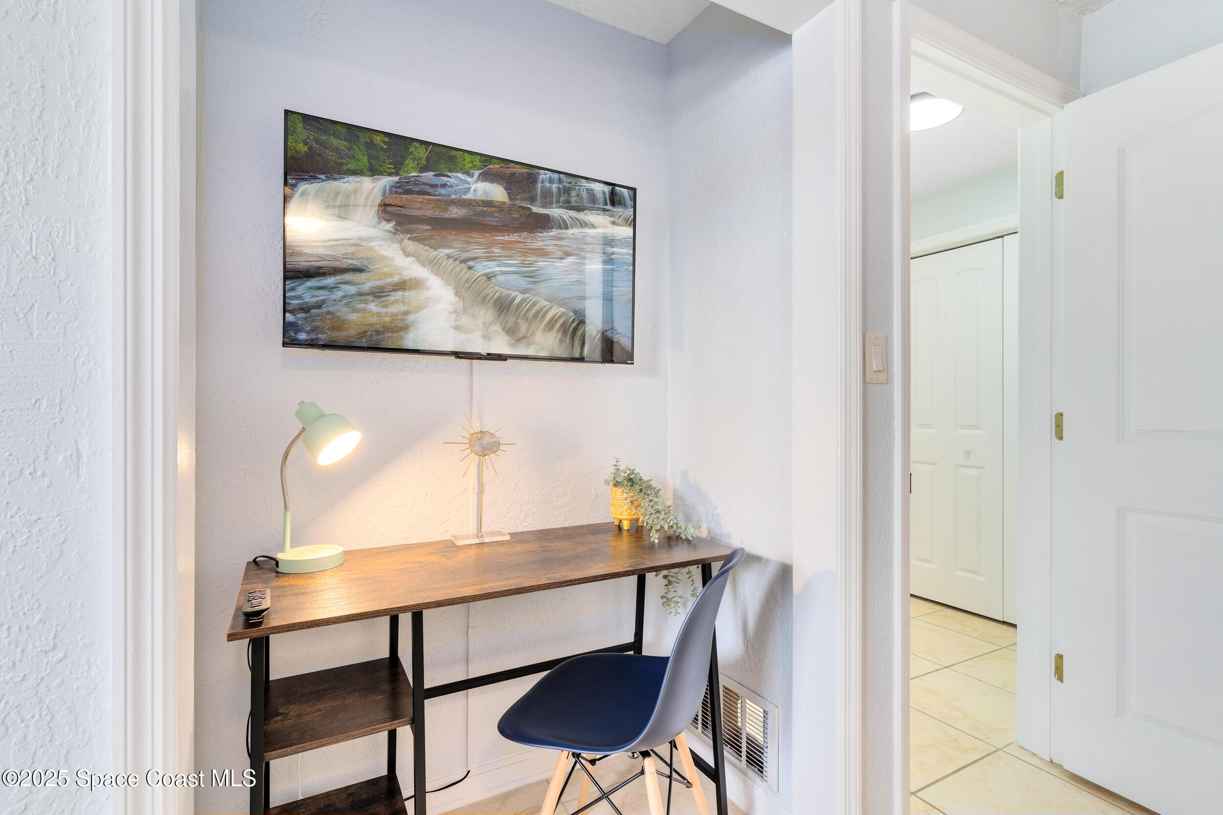 1029 Park Drive, Unit 32 Indian Harbour Beach, FL 32937 - Photo 14 of 35 a view of a workspace with furniture